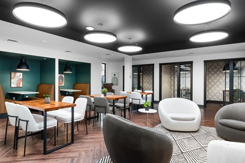 a room filled with furniture and a large window